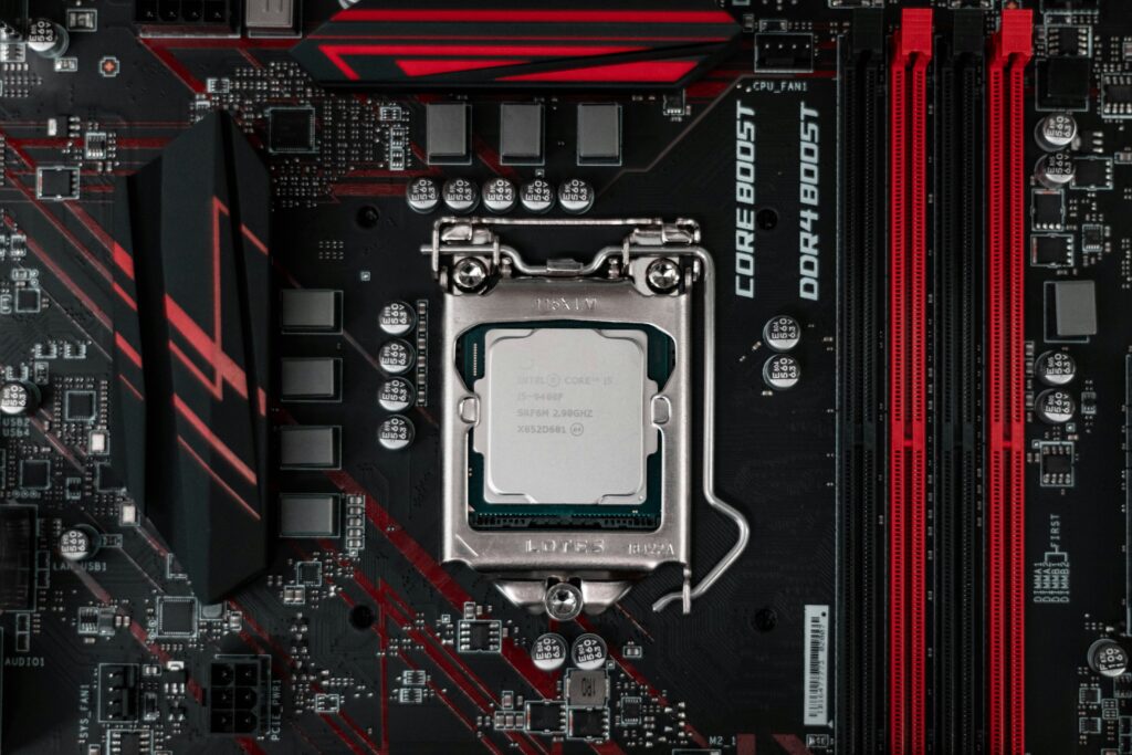 cpu chip on motherboard with red accent